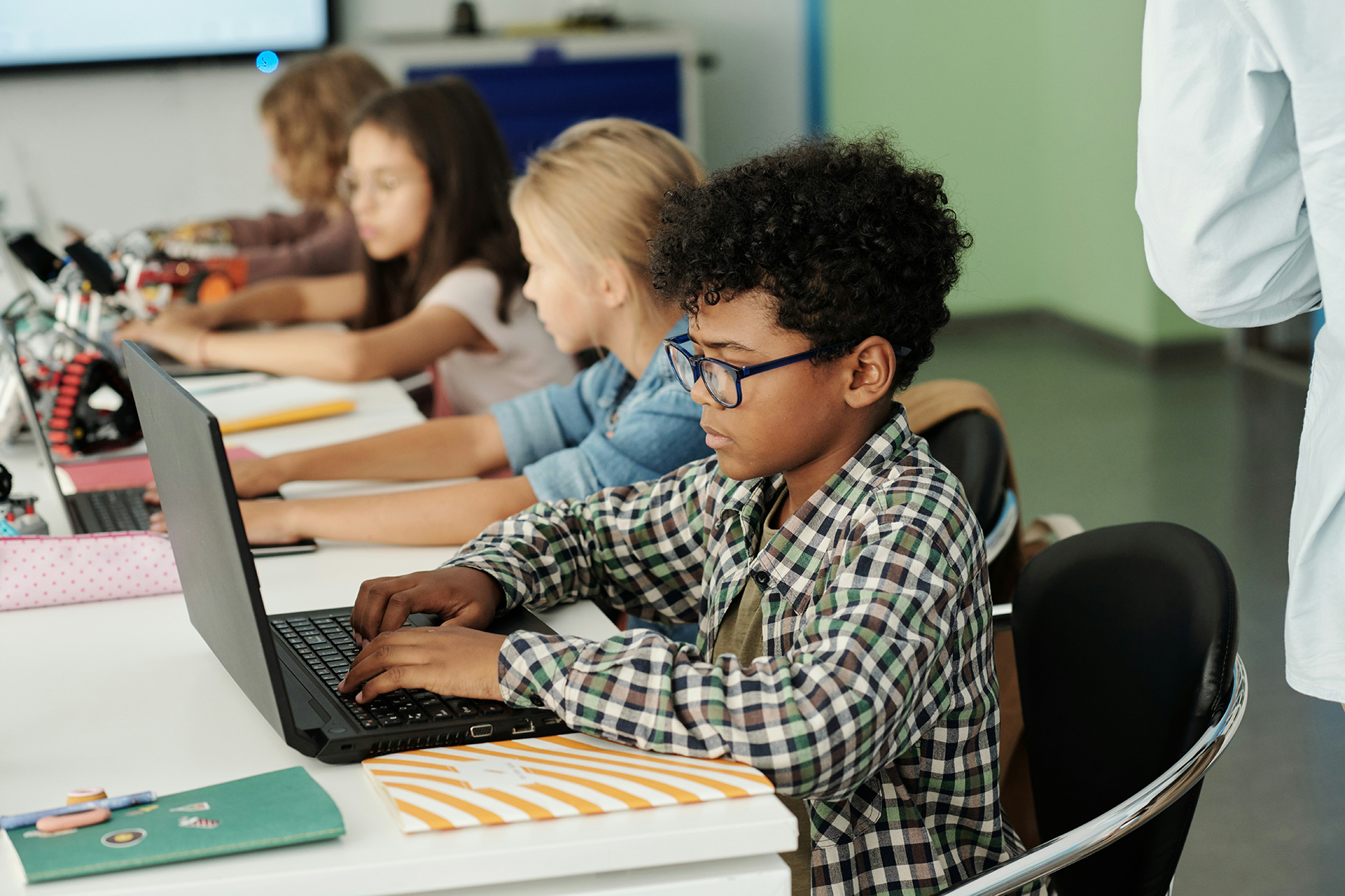 Young student participating in a technology workshop